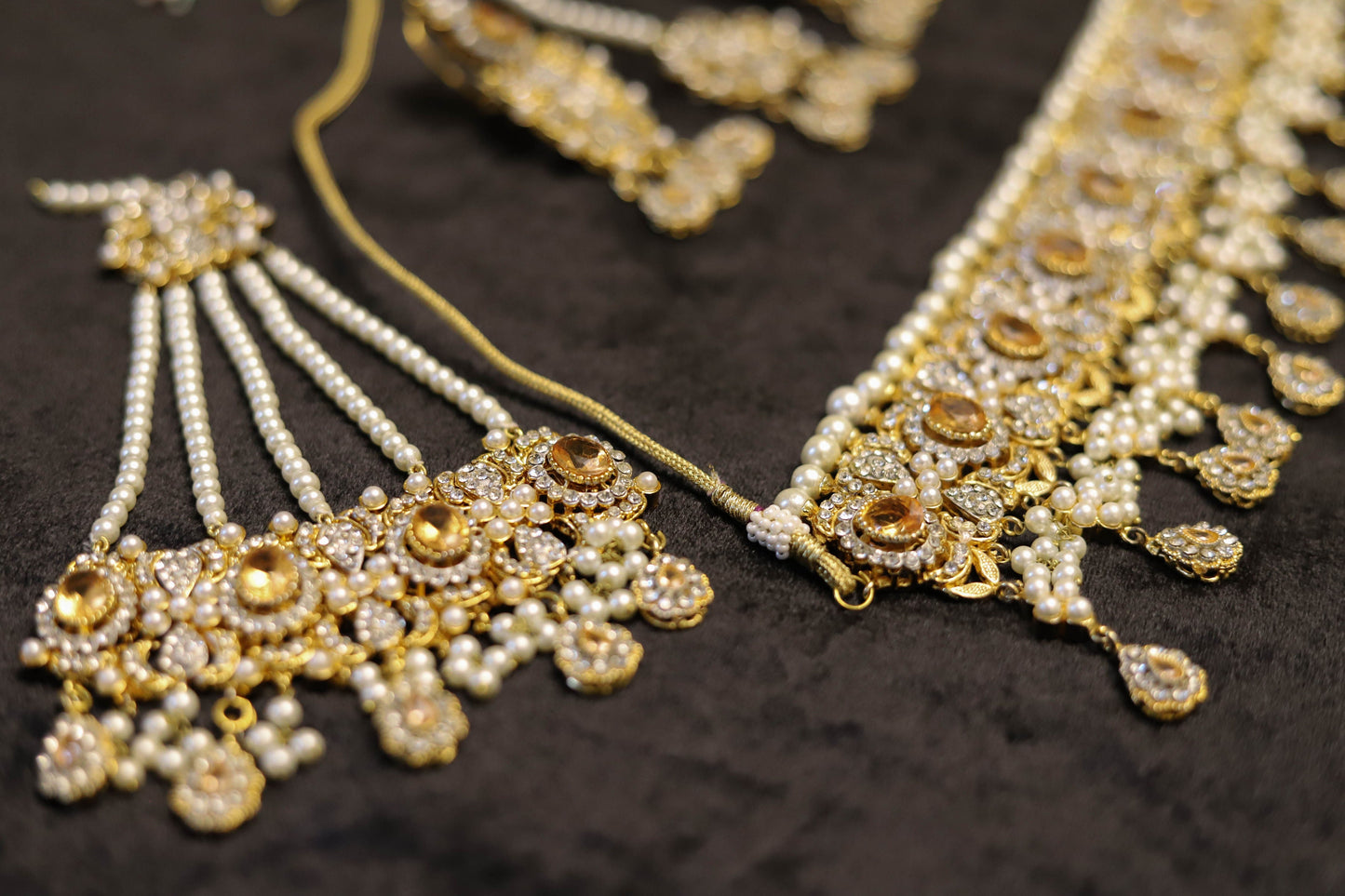 Champagne color kundan choker set with jhoomar and tikka