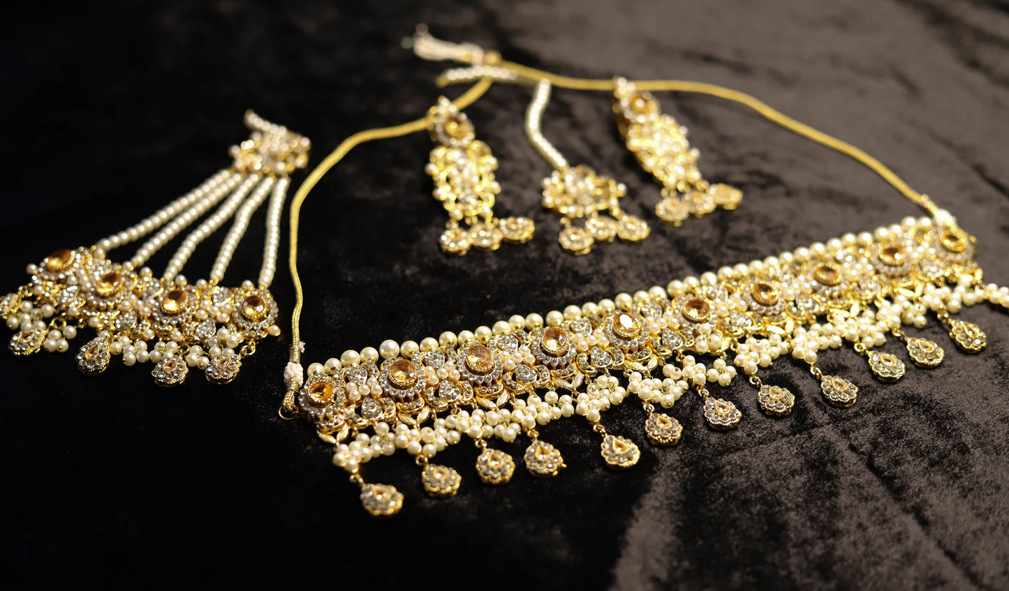 Champagne color kundan choker set with jhoomar and tikka